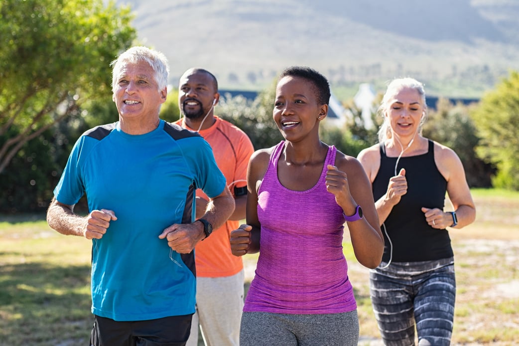 Adults Jogging Together at a Park